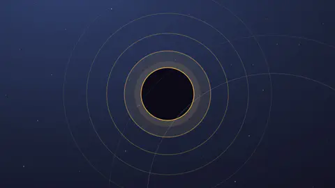 Disque éclipsé au centre d'ondes concentriques dorées